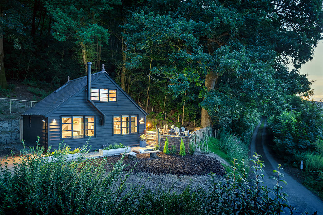 slide: From garage to fairytale cabin Woodland retreat