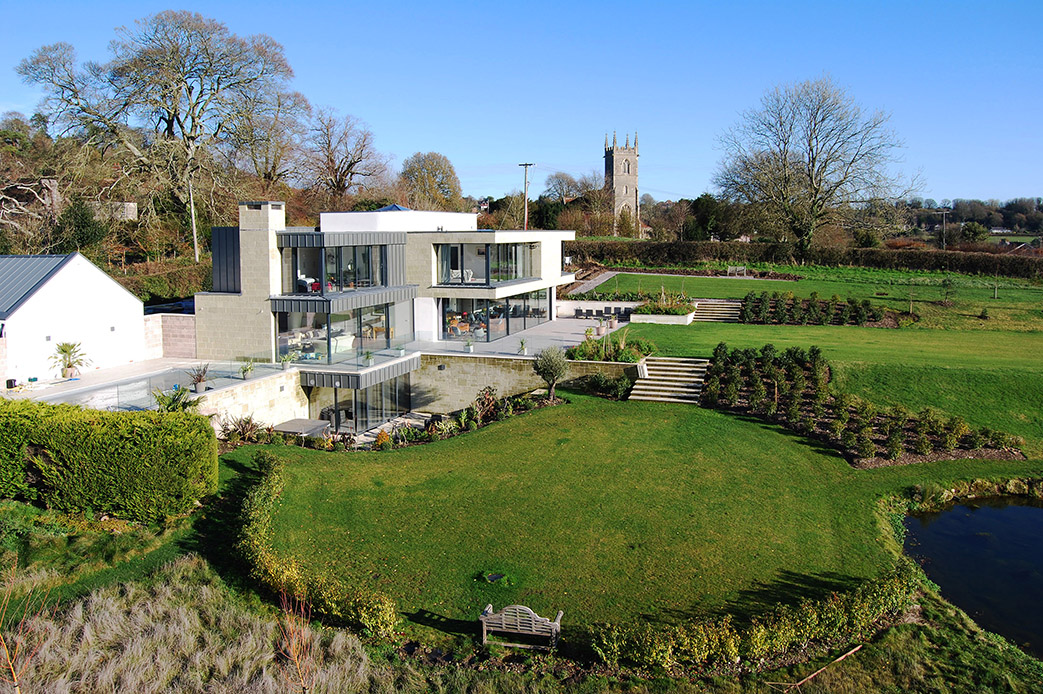 slide: Sustainable three-storey home in Dorset Sensitive and sustainable