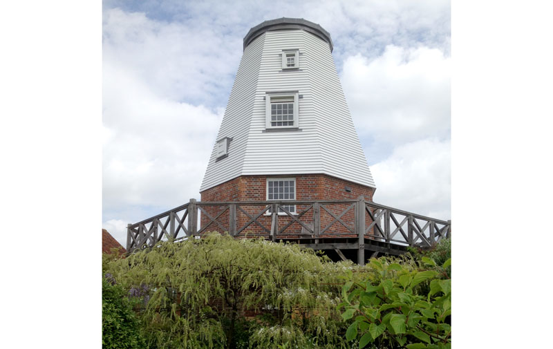 Unusual buildings such as this former windmill  ...