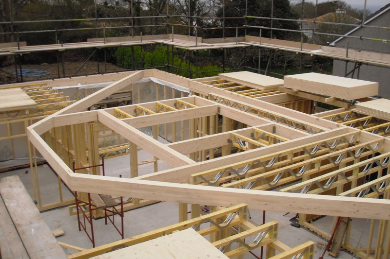 Timber frame house construction on site
