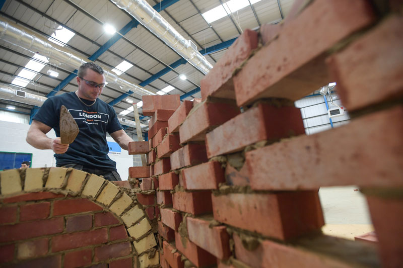 Bricklayer showing his skills in competition