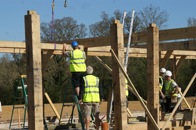 Oak frame assembly in builders framing yard