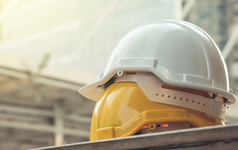 A hard hat is essential building site safety wear