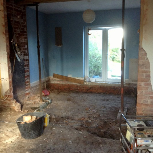 Passivehouse-retrofit-floor-dug-up-to-add-insulation-below.jpg